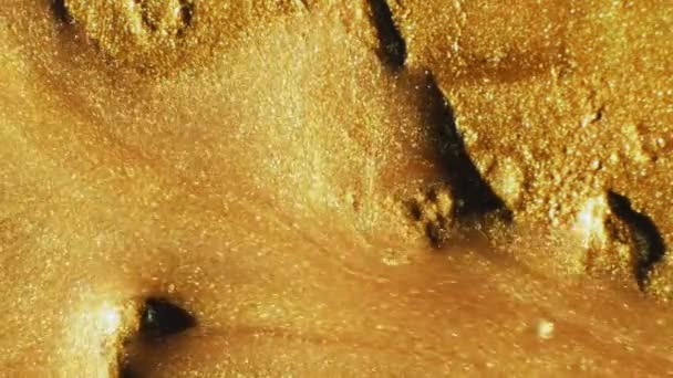 Λαμπερό Μελάνι Ροή Υγρού Άμμος Ερήμου Defocused Λαμπυρίζοντας Λαμπερό Χρυσό — Αρχείο Βίντεο