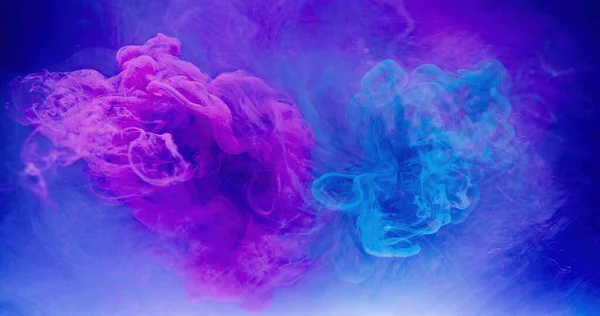 Color splash. Paint water. Ink drop. Bright pink blue vapor cloud floating on mist texture abstract art background with free space.