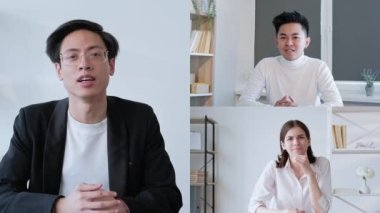 Video röportajı. Mesafe toplantısı. Profesyonel internet yayını. Başarılı erkek lider dijital ofiste çalışan çeşitli iş adamlarıyla konuşuyor..