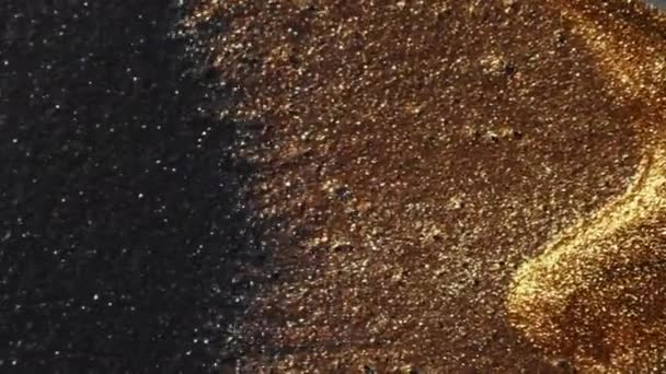 闪光的液体 墨水波 闪耀的沙子 凹凸不平的金青铜黑色渐变颗粒纹理涂料运动抽象背景 — 图库视频影像