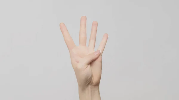 Gesto Mano Cuatro Números Mujer Mostrando Tres Dedos Sobre Fondo — Foto de Stock