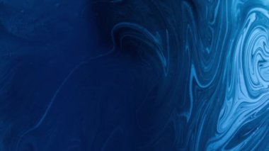 Mürekkep suyu. Sıvı karışımı. Mermer dokusu. Okyanus girdabı. Koyu mavi renkli sıvı yağlı boya. Kırmızı üzerine dalga akışı, soyut sanat arkaplan görüntüsü..