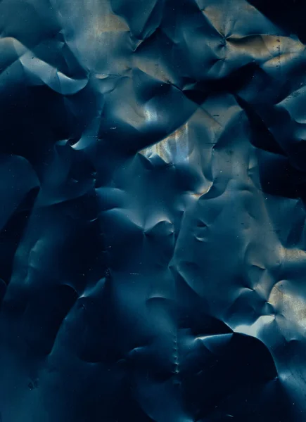 有褶皱的纹理Grunge覆盖 老电影效果 深色图解抽象背景下带有灰尘划痕锈蚀的蓝色橙色黑色皱褶磨损表面 — 图库照片