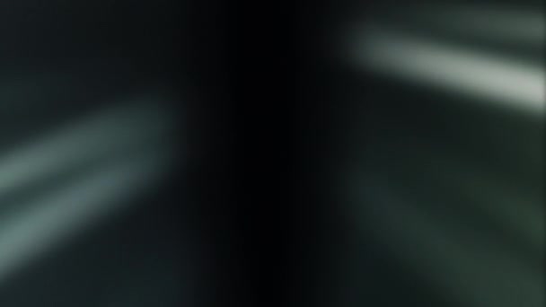 ライトフレア ぼかし 放射線漏れだ 濃い黒の抽象的な背景に緑の灰色の白い柔らかい質感のフリッカー線の動き — ストック動画