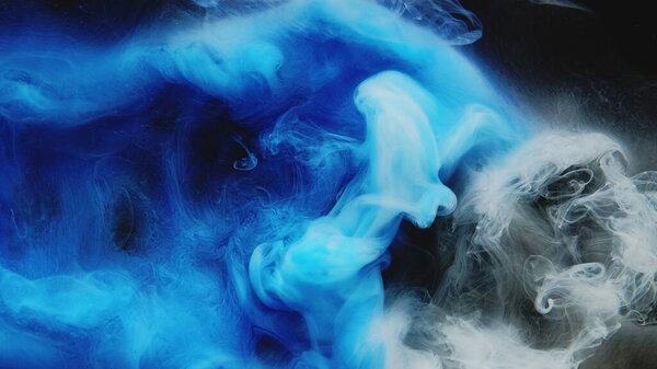 Paint water. Color smoke. Abstract background. Underwater splash. Blue gray glowing explosion vapor wave art texture on dark black.