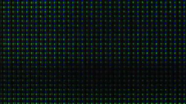 Arıza dokusu. Tahıl sesi. Ekran bozulması. Yeşil, pembe, parlayan pikselli, dijital objeler koyu siyah, soyut arka planda titreşiyor..