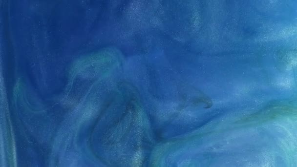 Glitter Vloeistof Inktwater Deeltjesstructuur Schilderswirl Blauwe Kleur Glanzend Gloeiende Sprankelende — Stockvideo