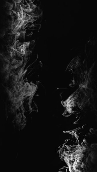 Smoke overlay. Gas texture. Night mist. Defocused transparent white fog spreading on dark black copy space abstract background.
