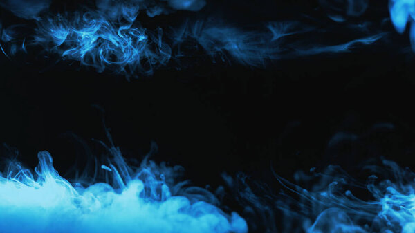 Color vapor. Smoke frame. Cold energy. Neon light blue night mist wave spreading on dark black empty space abstract background.