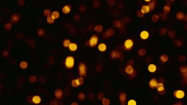 Bokeh Licht Waas Vonken Confetti Regen Gedempte Gouden Oranje Gloeiende — Stockvideo
