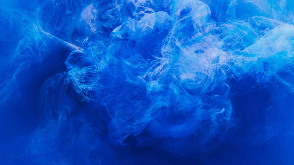 Ink flow background. Fume spreading. Ethereal cloud. Blue smoke puff explosion fantasy spiritual hypnotic mysterious dynamic energy burst effect.