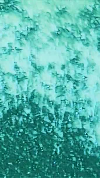 Vertical Video Bubbles Texture Drops Falling Sparkling Fluid Defocused Cyan — Stock Video