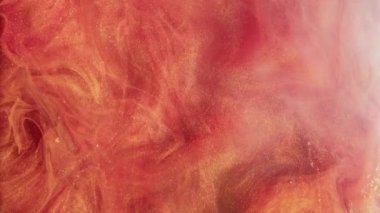 Parlak duman bulutu. Mürekkepli su sıçraması. Mercan kırmızısı parıldayan buhar akışı hareket parçacıkları dokusu soyut sanat arkaplanı yayıyor.