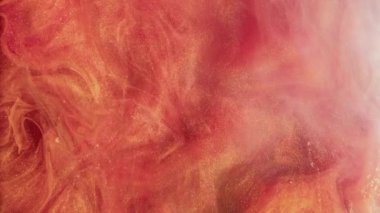 Parlak duman bulutu. Mürekkepli su sıçraması. Mercan kırmızısı parıldayan buhar akışı hareket parçacıkları dokusu soyut sanat arkaplanı yayıyor.