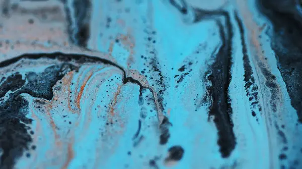 stock image Glitter emulsion sparkling background. Blue sand pink gold azure black shimmering paint particles blend spreading abstract art.