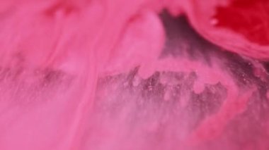 Köpüklü sıvı su damlası. Soyut akışkan sanat arka planı renkli kırmızı emülsiyon pembe karışım desen pigment sıçrama karışımı dalga boyası sıçraması.
