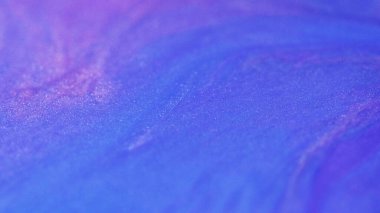 Parıltılı boya. Işıldayan jel. Odaklanmamış neon mavi renk emülsiyonu ışıltılı parçacıklar desen mürekkep yaratıcı tasarım hipnotik karışım.