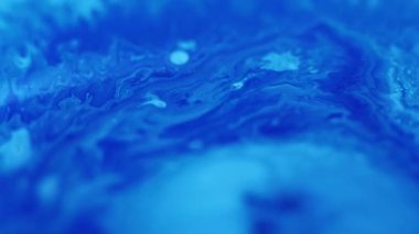 Boya damlası. Akrilik sıvı. Odaklanmamış mavi renk emülsiyonu sıvı sıçrama karışımı dalga akışı mermer desen soyut sanat arkaplanı.