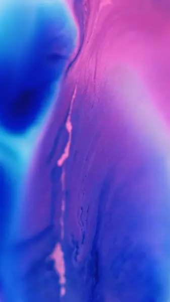 stock image Paint splash. Fluid spill. Defocused neon pink blue color gradient emulsion texture acrylic liquid mix wave flow abstract art background.