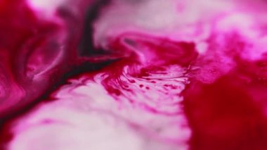 Mürekkep döküldü. Sıvı karışımı. Odaksız pembe beyaz renk ıslak akrilik emülsiyon karışık dalga akış mermer desen soyut sanat arka planı.