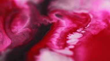 Mürekkep döküldü. Sıvı karışımı. Odaksız pembe beyaz renk ıslak akrilik emülsiyon karışık dalga akışı mermer desen soyut sanat arka planı.