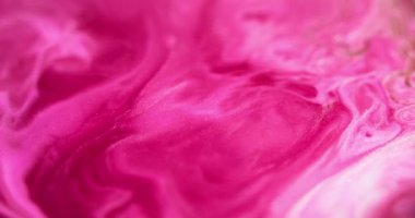 Parlak sıvı dokusu. Boya akışı. Odaklanmamış neon morumsu pembe beyaz renkli parıldayan mürekkep karışımı dalga hareketi soyut sanat arkaplanı.