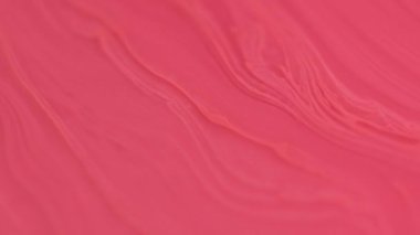 Yumuşak boya. Pürüzsüz. Odaklanmamış kırmızı turuncu renk yağ emülsiyonu parlak mürekkep deseni akış hareketi soyut sanat arkaplanı.