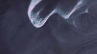 Mürekkep simleri. Duman bulutu. Mistik boya sanatı. Koyu gri, beyaz, parlak parçacıklar. Sıvı akrilik, koyu, hipnotik dalgalar..