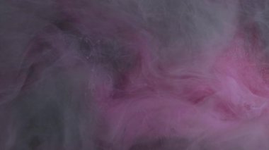 Pamuk şeker. Sisli bir gökyüzü. Yumuşak yumuşak renk, tatlı diş ipi dokusu. Modern ışık sanatının soyut arka planında pembe beyaz kesişme eğilimi.