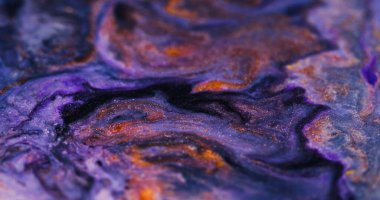 Işıl ışıl. Mürekkep akışı. Odaklanamayan mor, parıldayan parlak boya sıvısı mermer desen parlak parçacıklar soyut, bulanık bokeh ışık sanat arka planında hareket ediyorlar..