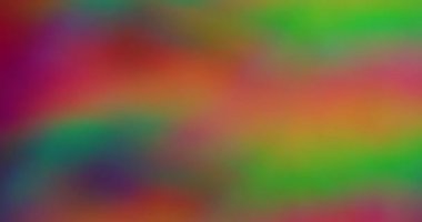 Soyut bulanıklık. Renkli bir arkaplan. Odaksız sızıntı. Sarı ışınlar. Gökkuşağı titreşimleri..
