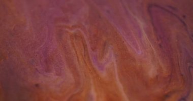 Mermer sıvısı. Bulanık boya dökülmüş. Odaklanmamış mor turuncu renk parıldayan desen emülsiyon mürekkep akışı dalgası karışım soyut sanat arka planı.