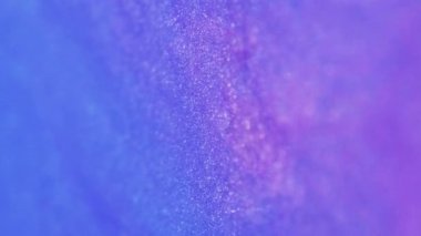 Köpüklü sıvı. Işıldayan jel. Renkli neon rengi pembe boya dökülmesi emülsiyon hareketi güzel yaratıcı tasarım hipnotik çözülmüş karışım.