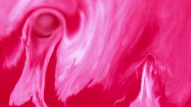 Boya damlası dökülmüş. Mürekkep damlası. Bulanık kırmızı pembe beyaz baloncuk emülsiyon sıvısı sıçrama karışımı soyut sanat arkaplan dalgası.