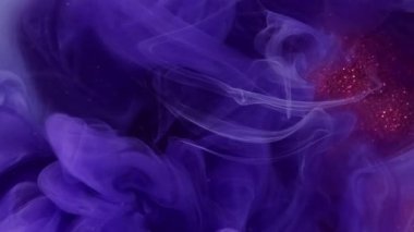 Renkli duman arka planı. Mürekkep suyu. Odaklanmamış mavi toz parçacıkları dokusu soyut buhar parlayan kırmızı ışıltılı yüzey üzerinde yüzüyor.