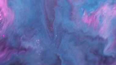 Odaklanmamış renk sıçraması. Boya karışımı. Bulanık mavi parçacıklar dokusu akrilik mürekkep karışımı dalga akışı yaratıcı arkaplan.