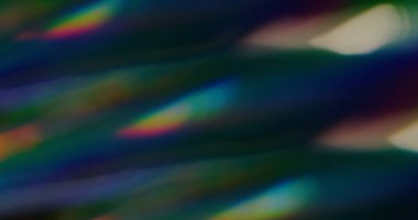 Renkli ışık efekti. Soyut parti geçmişi. Odaksız sızıntı. Sarı ışınlar. Gökkuşağı. Renkli ışınlar..