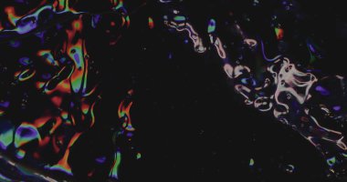 Köpüklü köpükler. Bulanık ıslak doku. Odaksız sızıntılı turuncu ışınlar gökkuşağı renkleri titreşimler, soyut sanat ışığı arka planında ışık yansıması..