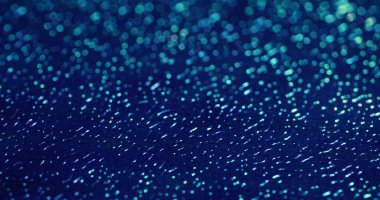 Bulanık rahatlama. Yapay deri. Mavi dalgalı plastik yüzey ve değişen ışık. Dekoratif parlak parlamalı kabartmalı arkaplan.