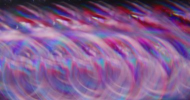 Bulanık mercek parlaması. Bokeh ışığı. Çok renkli kırmızı parçacıklar soyut parlak arka planda şeffaf parlak sabunlu daireler..