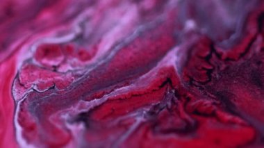 Parlak mürekkep. Suyu boya. Karışık jöle. Bulanık kırmızı beyaz renk parıldayan parçacıklar sıvı dalga hareketi soyut sanat arkaplanı.
