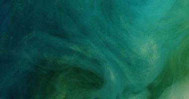 Parıldayan bulut. Bulanık mürekkep suyu. Sihirli sisli, parlak, yeşil, mavi renk parçacıkları desen, ışık soyut arkaplanda fırtına dalgası..