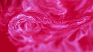 Soyut akış. Sıvı mermer. Sanat arka planında pembe kırmızı beyaz renkler. Akrilik bir tablo, kızıl bir renk ve su sıçraması ile tuvalde..