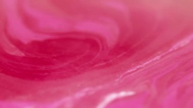 Girdap dalgası. Boya sıvısı akışı. Bulanık pembe parlak akrilik sıvı mürekkep karışımı pigment emülsiyon ıslak doku dalgası hareket soyut sanat arka planı.