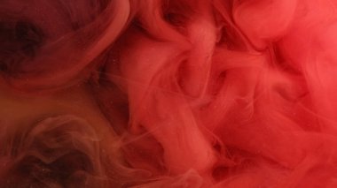 Kırmızı bulut. Boya sıçraması. Suyun soyut arka planında yüzen parlak renkli duman buhar dalgası doku mürekkebi.