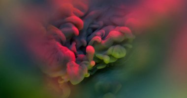 Boya patlaması. Renkli akış. Sis sıvısı yüzeyinde duman bulutu patlaması. Gizemli su grunge soyut arkaplan bulanıklığı.