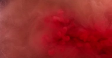 Sis mürekkebi. Boya patlaması. Su altı boya karışımı akış arkaplanı şişirilmiş çekim. Kırmızı turuncu renk sıvı sisi çözdü. Mistik buhar dokusu..