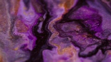 Görüntü sıçraması. Boya girdabı. Odaklanmamış çok renkli mor ışıltılı ışıltılı parlak akış mermer desen parlak parçacıklar soyut bokeh ışık sanat arka planında hareket ediyorlar.