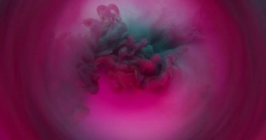 Duman patlaması. Pigment akışı. Pembe mor arka plan dairesi objektifi üzerindeki mat sim sprey karışımı mürekkep bulutu bulanıklaştırır..