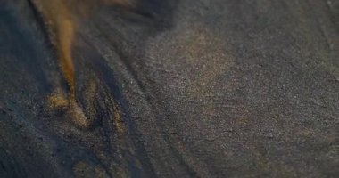 Sanat sıvısı. Parlayan kül. Grunge sıvı, ışıl ışıl, volkanik, altın, gri, kumlu boya akışı soyut, emülsiyon arkaplanı çözmüş..